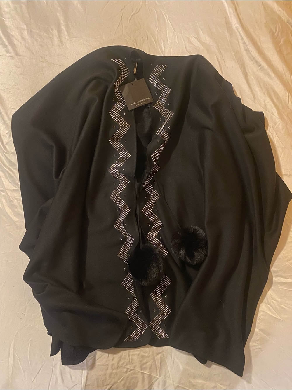 Andrew Marc Black Sweater Poncho with Zigzag Rhinestone Trim and Pom Pom Ties